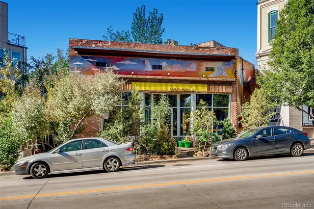 a car parked in front of a house