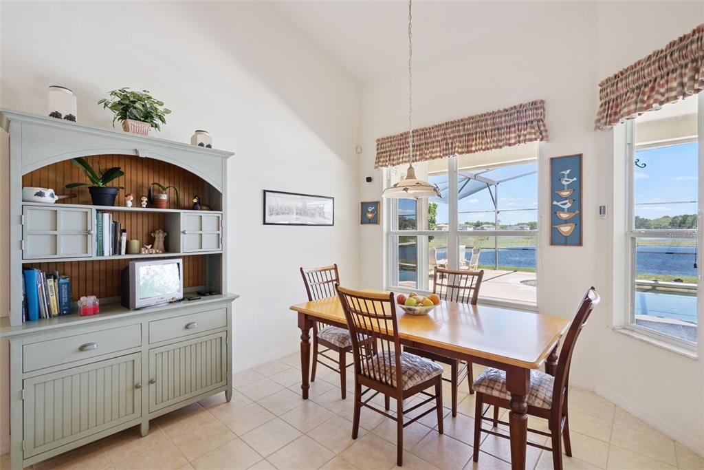 1584 Cherry Ridge Drive Lake Mary, FL 32746 - Photo 12 of 62 a dining room with furniture and window