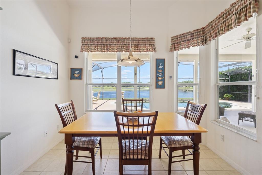 1584 Cherry Ridge Drive Lake Mary, FL 32746 - Photo 13 of 62 a view of a dining room with furniture window and outside view