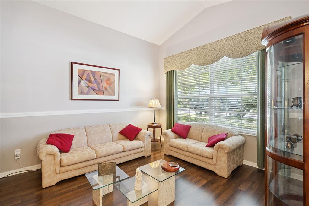 1584 Cherry Ridge Drive Lake Mary, FL 32746 - Photo 22 of 62 a living room with furniture or couch and a large window