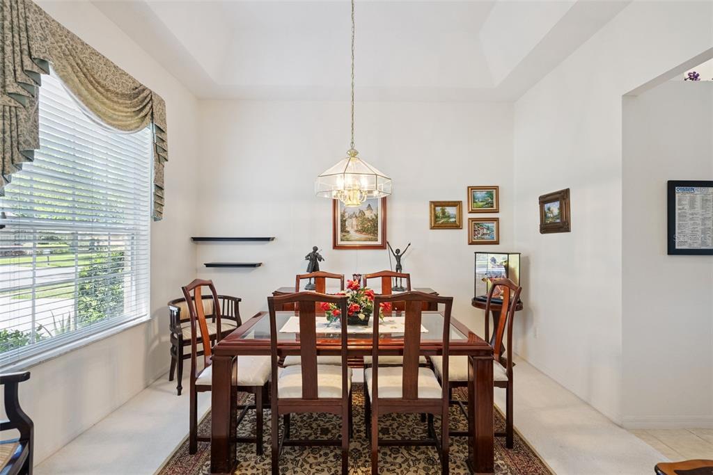 1584 Cherry Ridge Drive Lake Mary, FL 32746 - Photo 25 of 62 a view of a dining room with furniture and window