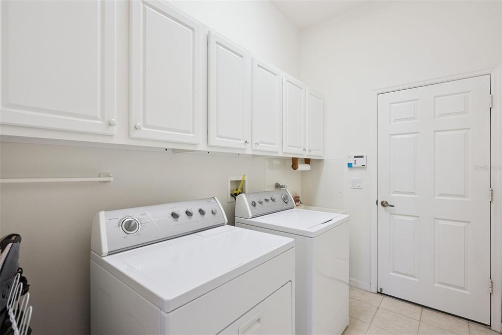 1584 Cherry Ridge Drive Lake Mary, FL 32746 - Photo 26 of 62 a utility room with dryer and washer