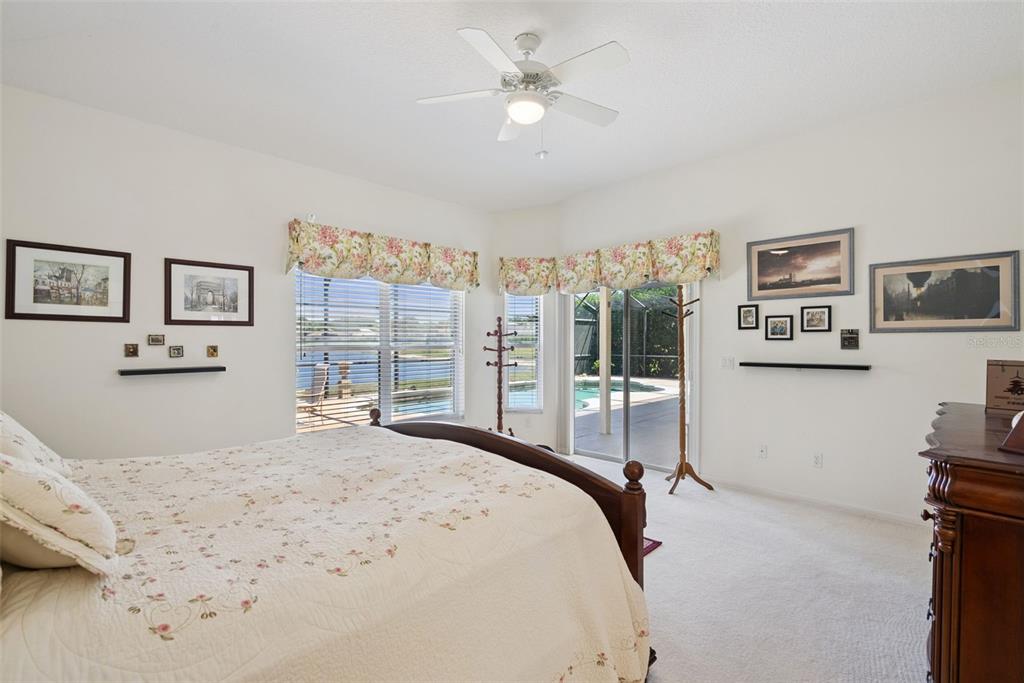 1584 Cherry Ridge Drive Lake Mary, FL 32746 - Photo 27 of 62 a bedroom with a large bed and a large window