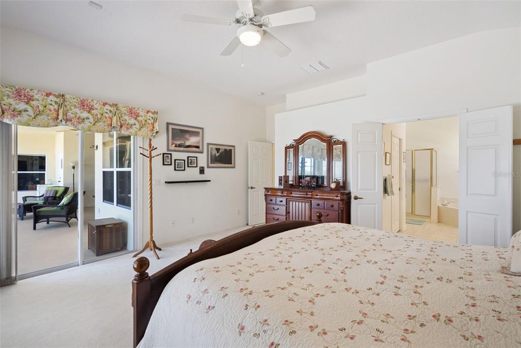 1584 Cherry Ridge Drive Lake Mary, FL 32746 - Photo 29 of 62 a bedroom with a bed and a flat screen tv