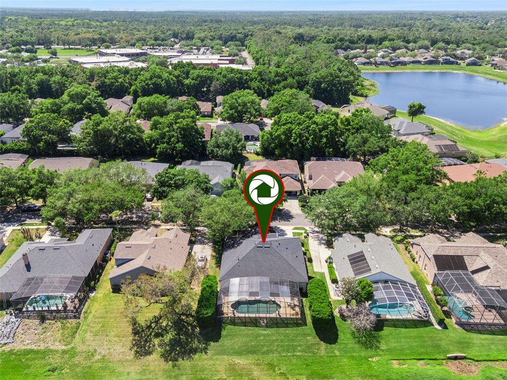 1584 Cherry Ridge Drive Lake Mary, FL 32746 - Photo 52 of 62 an aerial view of residential houses with outdoor space and river