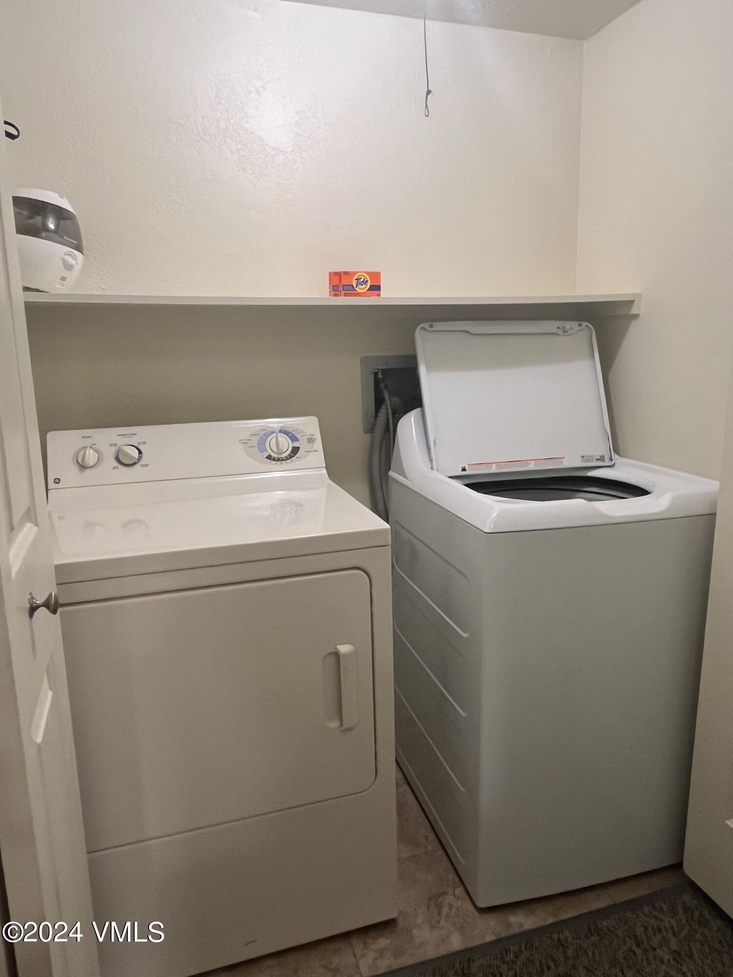1020 Vail View Drive, Unit 340846 Vail, CO 81657 - Photo 9 of 25 a utility room with dryer and washer