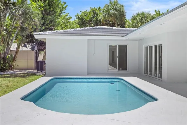 a view of outdoor space yard and swimming pool