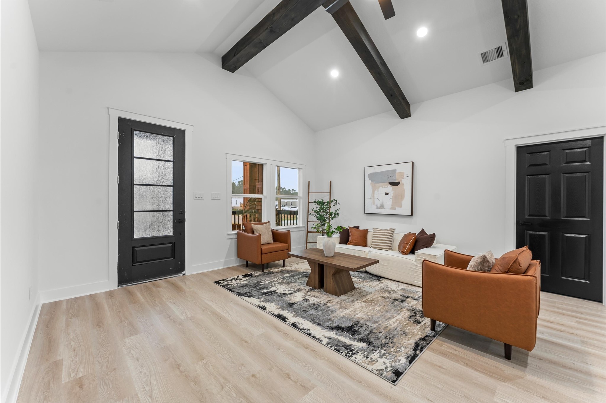 1133 Longleaf Pne Street Huffman, TX 77336 - Photo 8 of 25 Bright and open living area with soaring cathedral ceilings and recessed lighting.