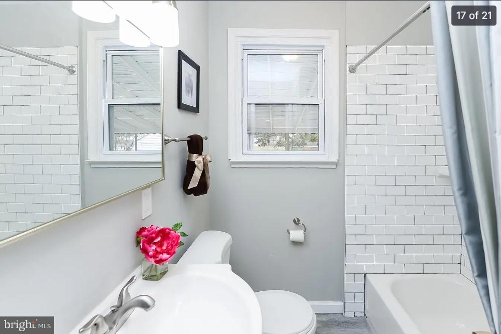 112 Upland Road Brookhaven, PA 19015 - Photo 17 of 21 a bathroom with a sink toilet and shower