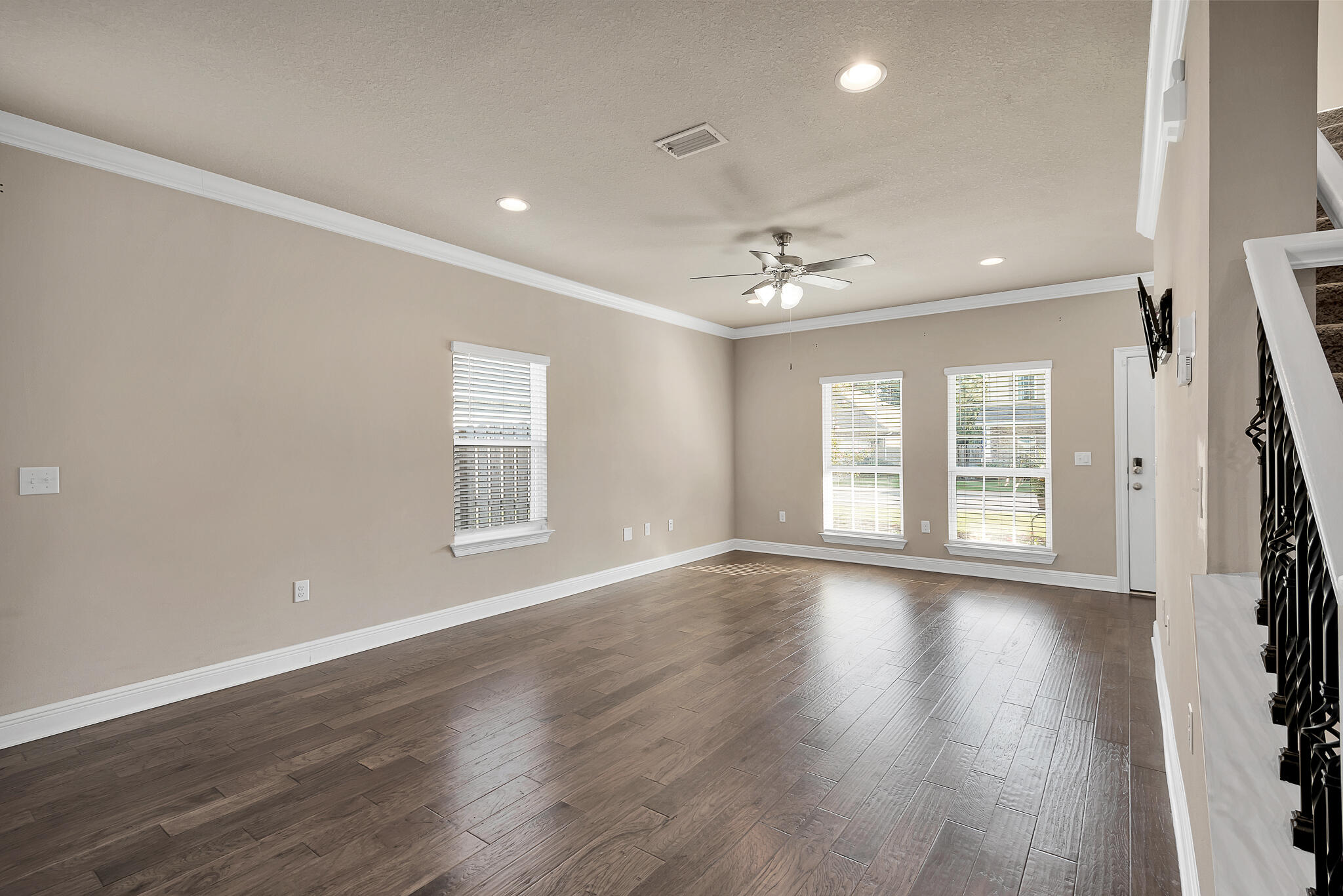 40 Constance Court Santa Rosa Beach, FL 32459 - Photo 16 of 44 a view of an empty room with wooden floor and a window