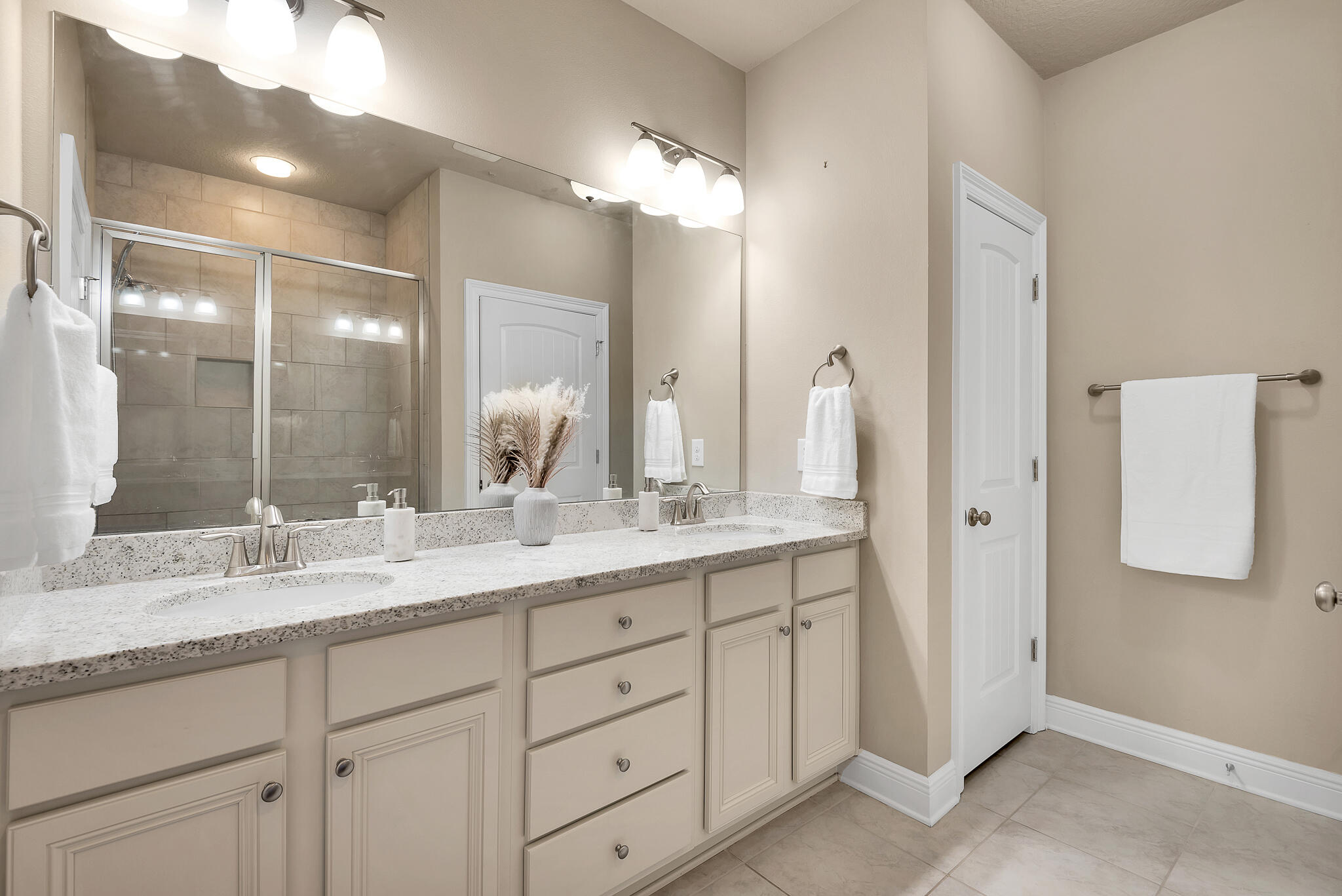 40 Constance Court Santa Rosa Beach, FL 32459 - Photo 20 of 44 a bathroom with a granite countertop sink and a mirror