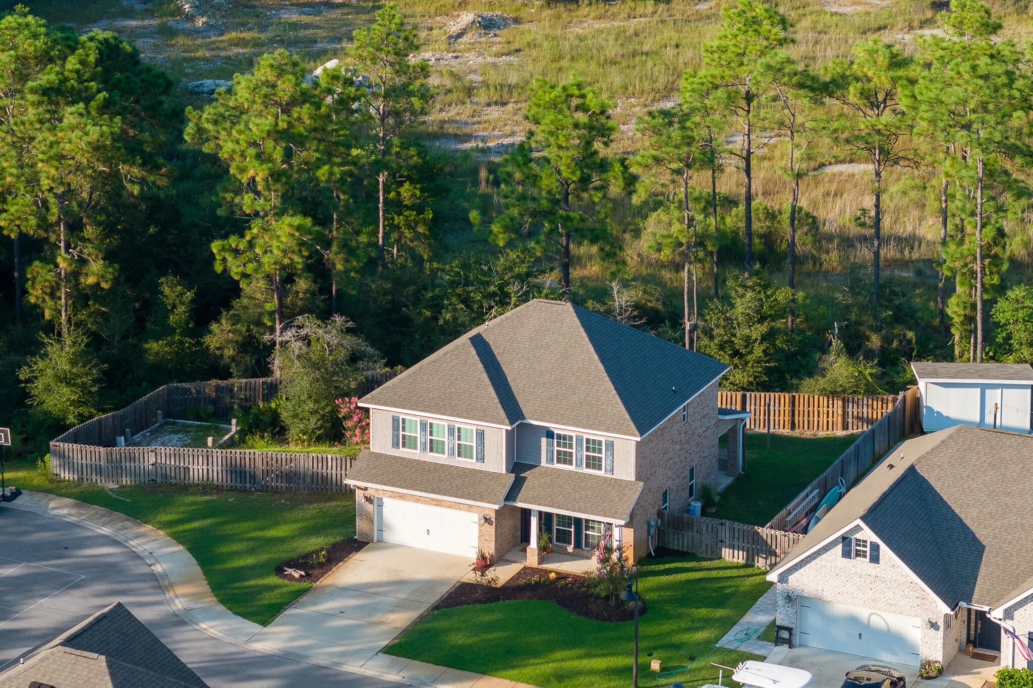 40 Constance Court Santa Rosa Beach, FL 32459 - Photo 2 of 44 a front view of a house with a garden