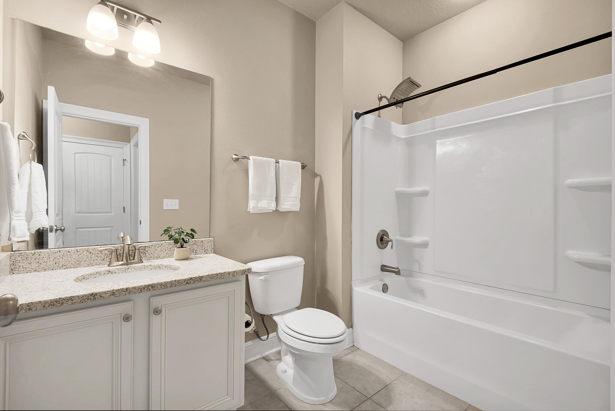 40 Constance Court Santa Rosa Beach, FL 32459 - Photo 32 of 44 a bathroom with a sink toilet vanity and shower