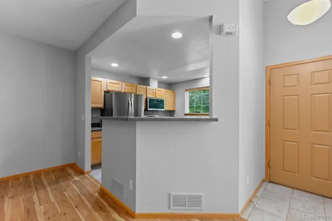 a view of a kitchen with a sink