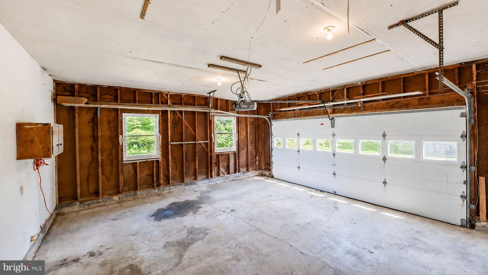 223 Trythall Road Elverson, PA 19520 - Photo 59 of 78 a view of an empty room with a garage
