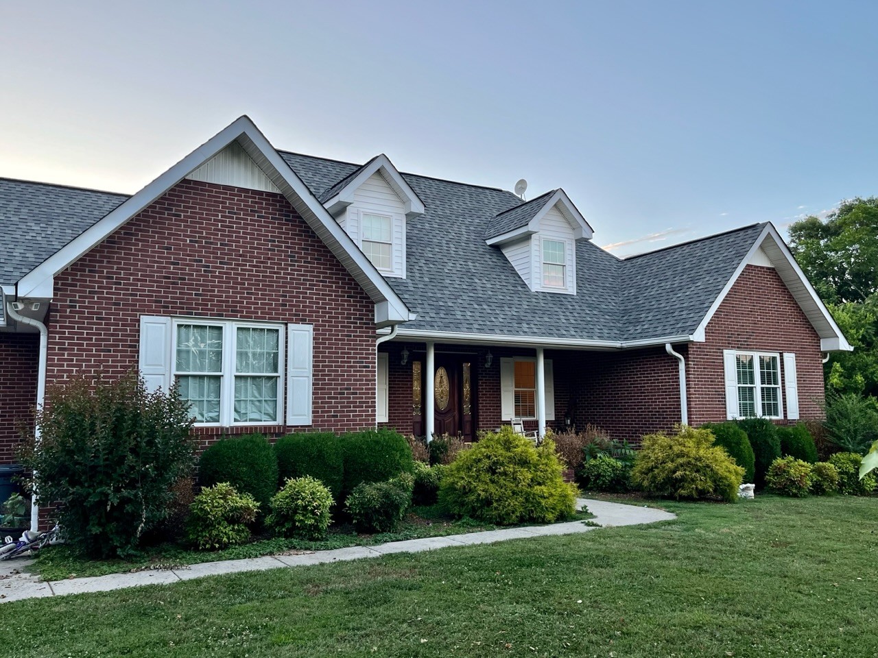 1056 Lois Ridge Road Lynchburg, TN 37352 - Photo 2 of 45 a front view of a house with a yard