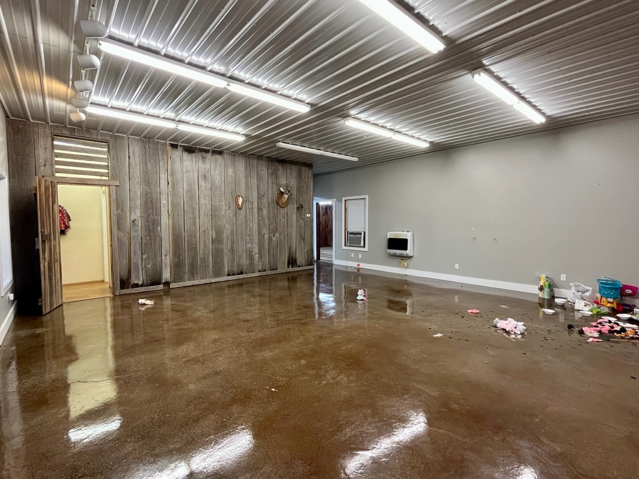 1056 Lois Ridge Road Lynchburg, TN 37352 - Photo 30 of 45 a room with lots of clutter and stainless steel appliances
