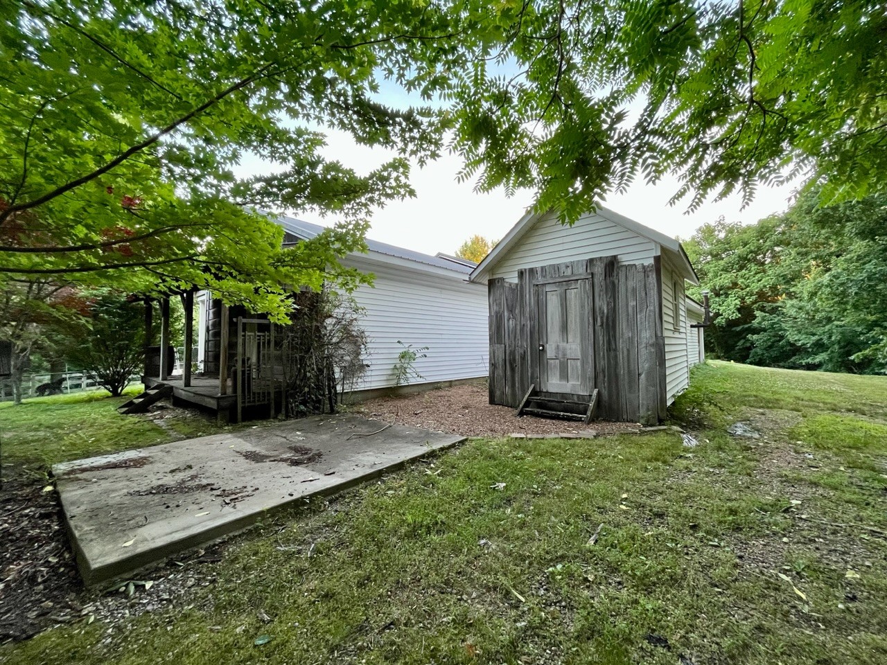 1056 Lois Ridge Road Lynchburg, TN 37352 - Photo 36 of 45 a view of a house with a yard