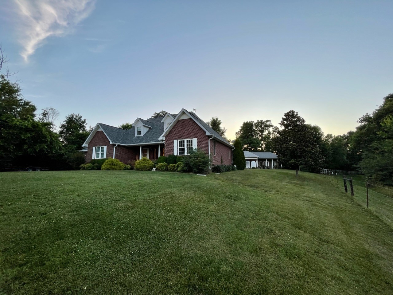 1056 Lois Ridge Road Lynchburg, TN 37352 - Photo 4 of 45 a front view of a house with garden