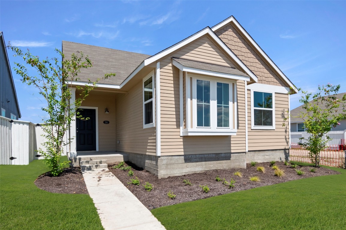 190 Backwater Road Kyle, TX 78640 - Photo 1 of 1 a front view of a house with a garden and yard