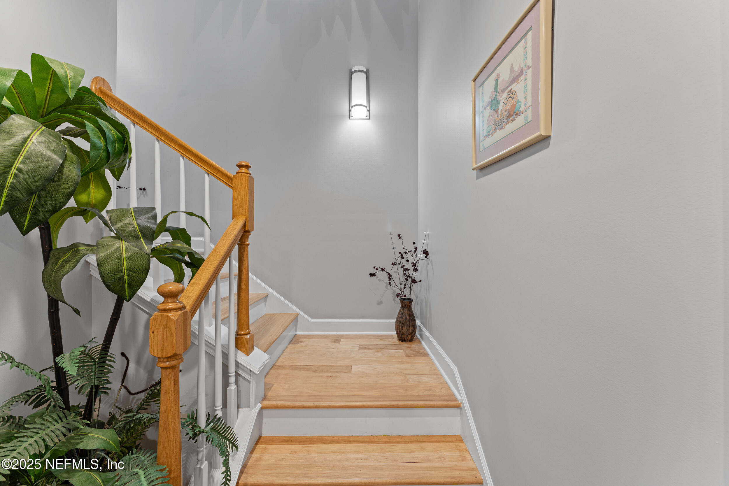 1475 Course View Drive Fleming Island, FL 32003 - Photo 19 of 70 a view of a hallway with wooden floor