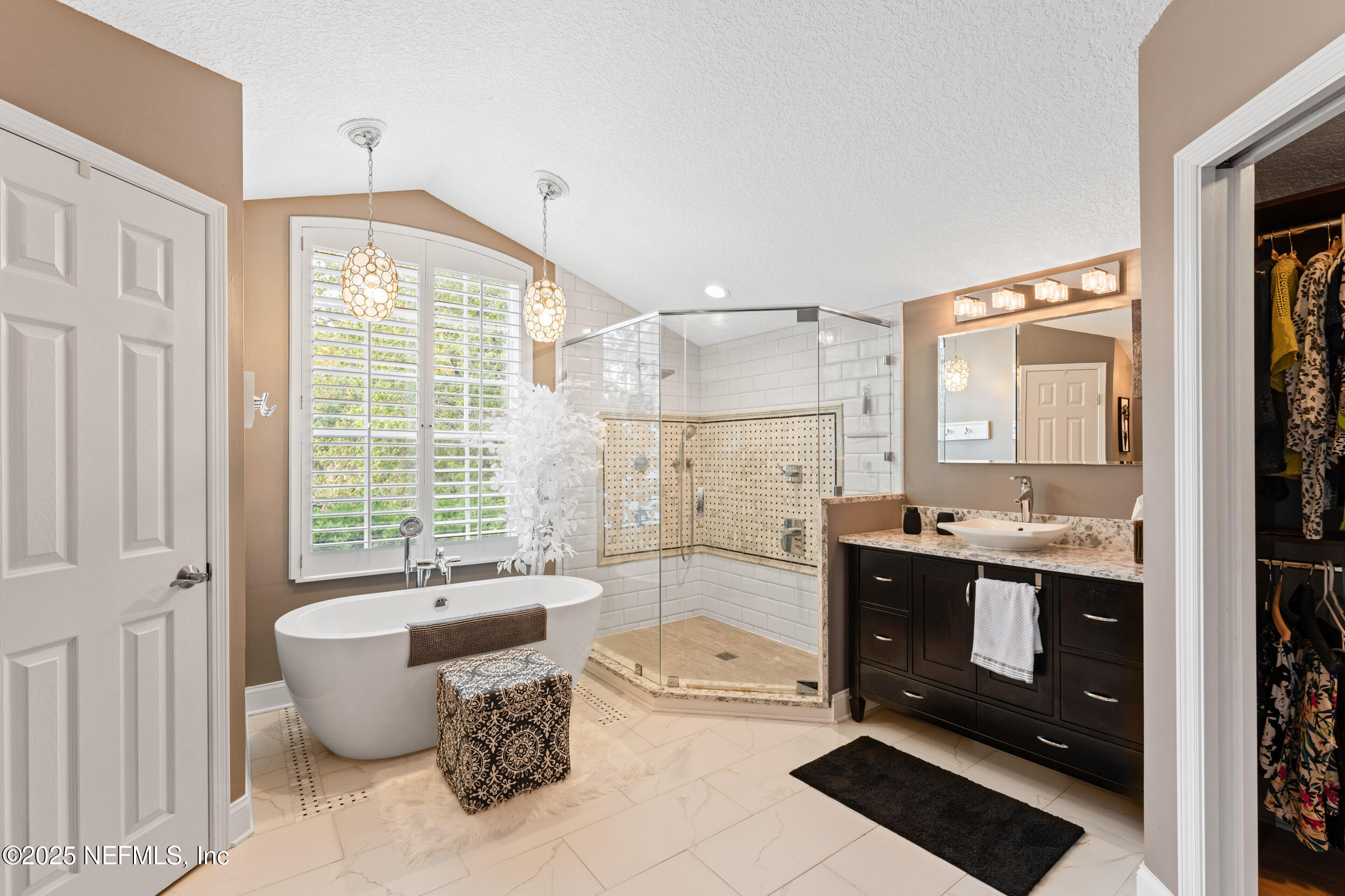 1475 Course View Drive Fleming Island, FL 32003 - Photo 22 of 70 a spacious bathroom with a tub sink and glass door