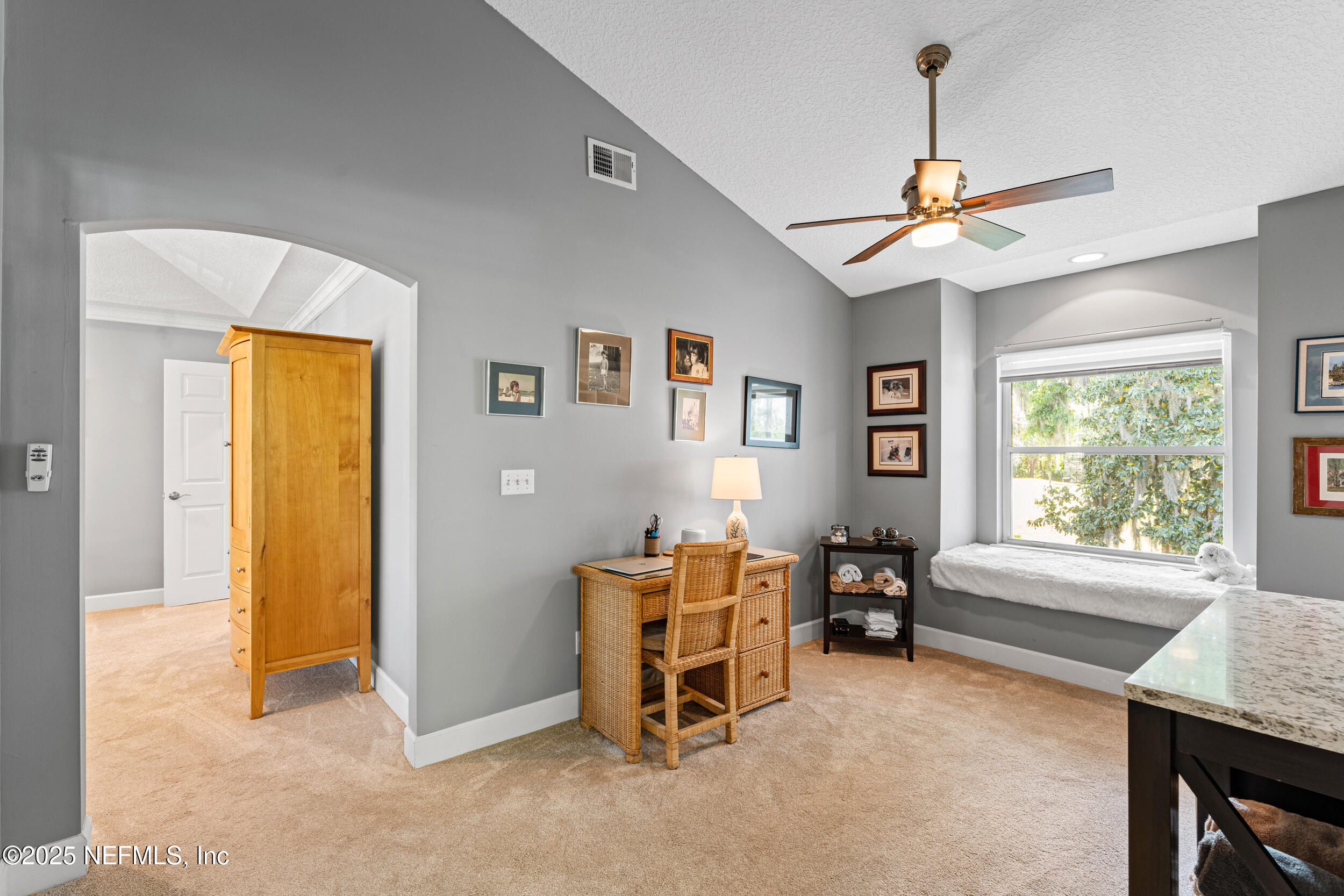 1475 Course View Drive Fleming Island, FL 32003 - Photo 25 of 70 a living room with furniture and a window