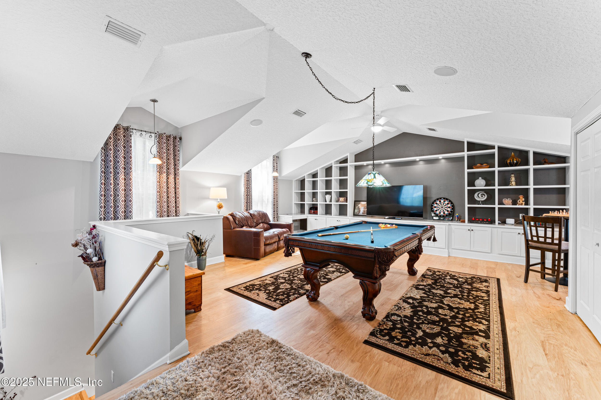 1475 Course View Drive Fleming Island, FL 32003 - Photo 26 of 70 a living room with furniture a rug and white walls