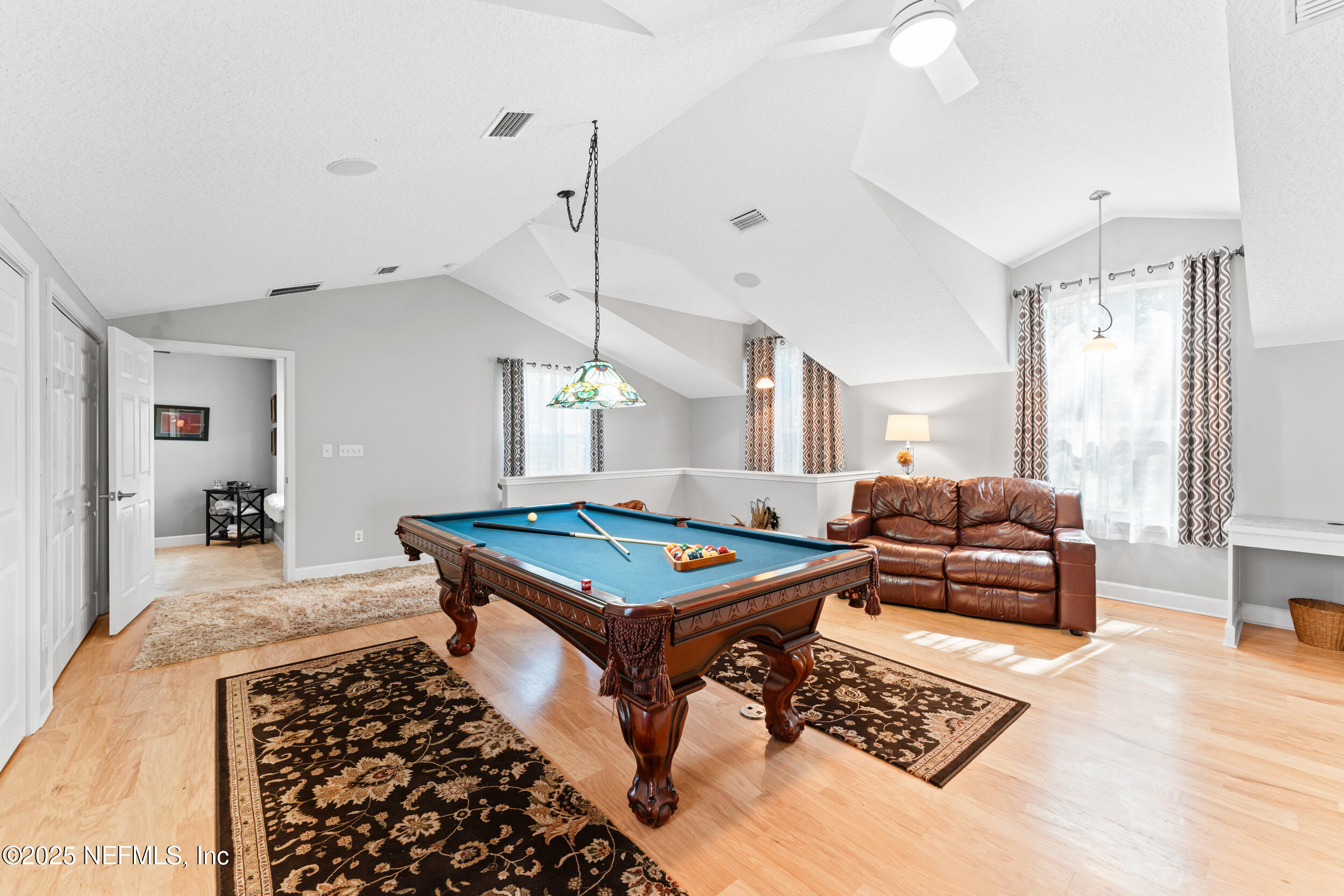 1475 Course View Drive Fleming Island, FL 32003 - Photo 27 of 70 a living room with furniture and a table