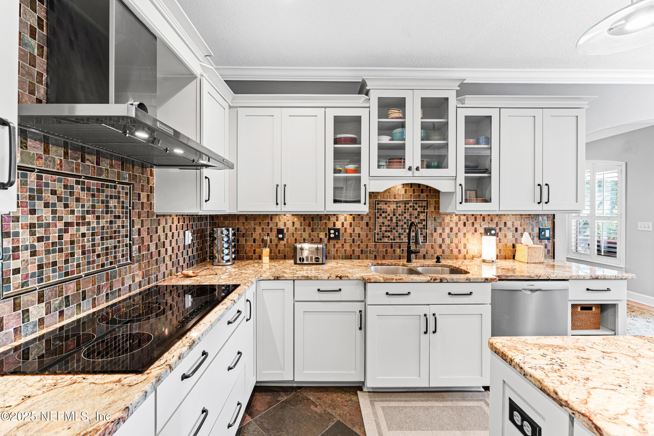 1475 Course View Drive Fleming Island, FL 32003 - Photo 3 of 70 a kitchen with a sink stove top oven and cabinets