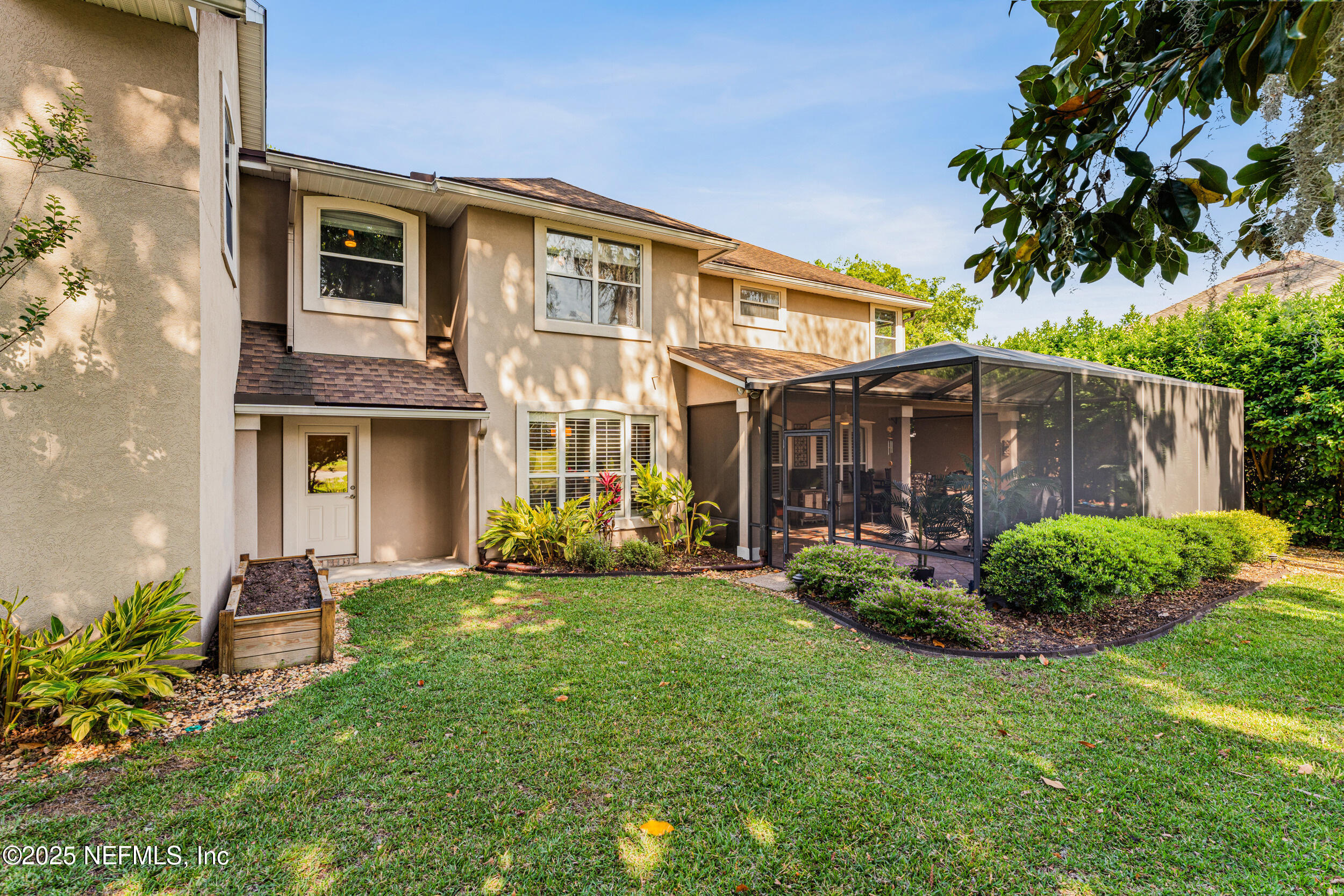 1475 Course View Drive Fleming Island, FL 32003 - Photo 36 of 70 a view of a house with a yard and sitting area