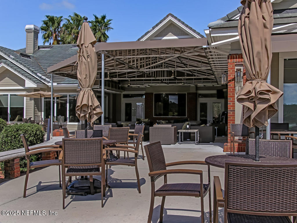 1475 Course View Drive Fleming Island, FL 32003 - Photo 66 of 70 a view of a cafe with sitting area