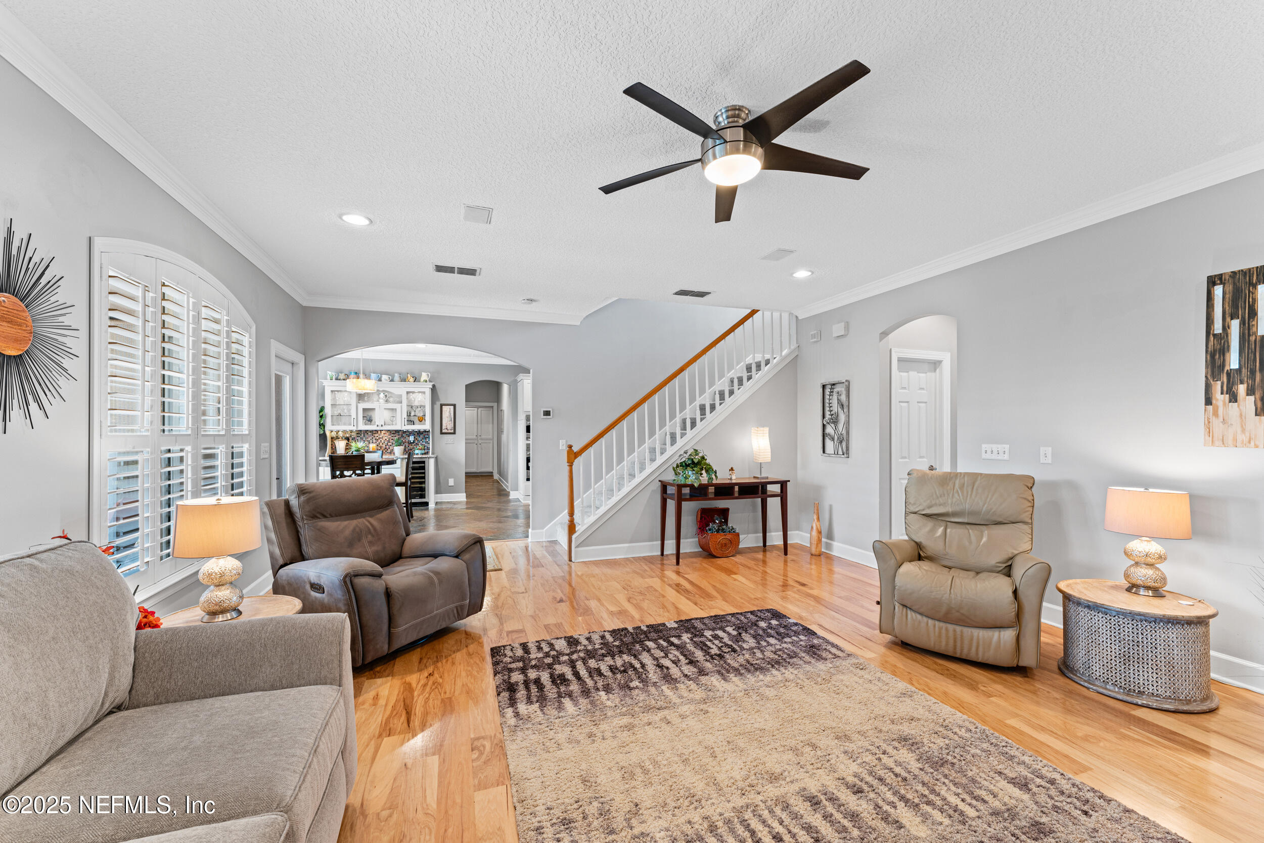 1475 Course View Drive Fleming Island, FL 32003 - Photo 9 of 70 a living room with furniture and a large window