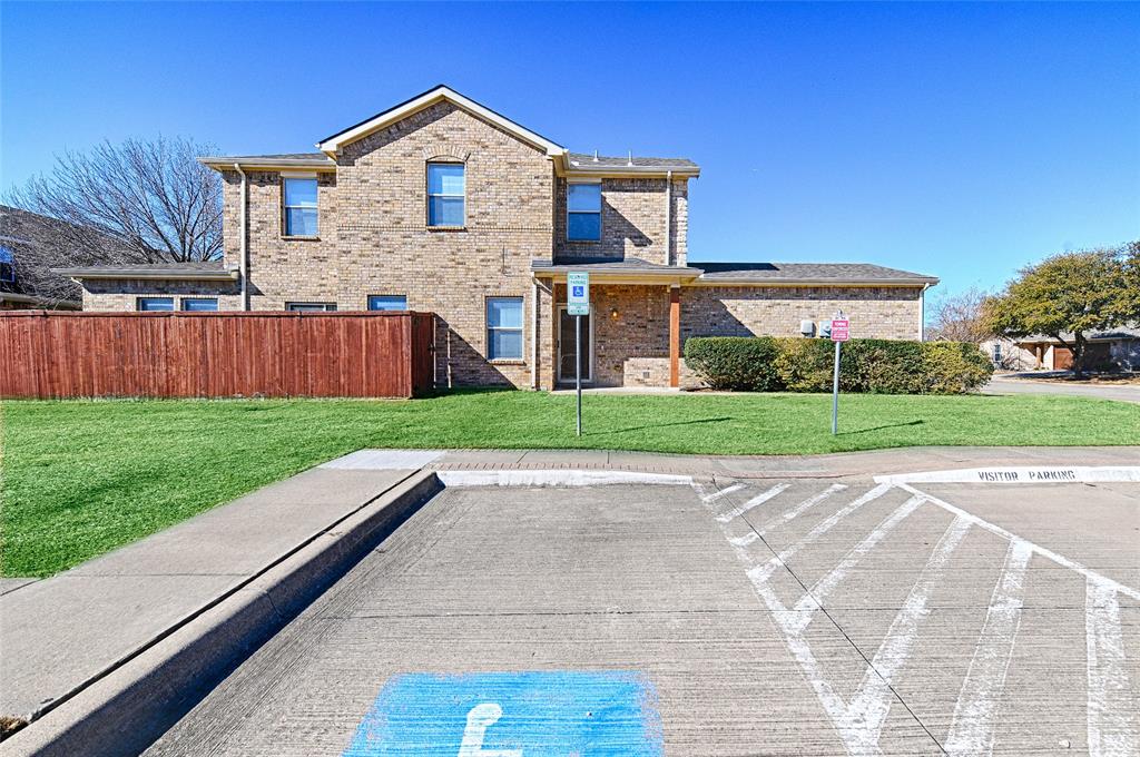 5984 Stone Mountain Road The Colony, TX 75056 - Photo 8 of 25 a view of front of house with a yard