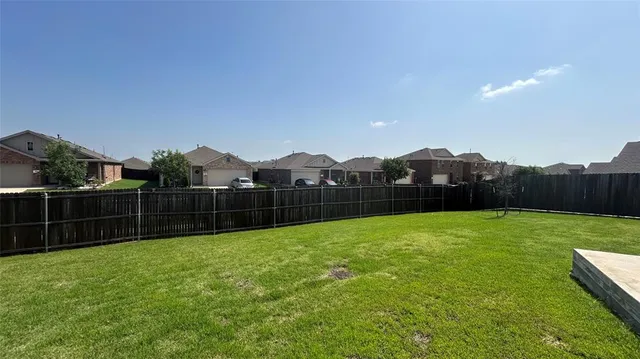 a view of an outdoor space and a yard