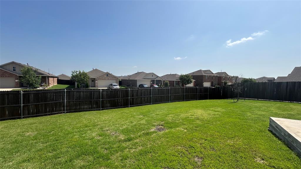 331 Buckeye Avenue Princeton, TX 75407 - Photo 18 of 22 a view of a backyard