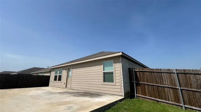 a view of house with roof deck