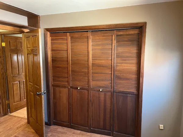 wooden floor and window in a room
