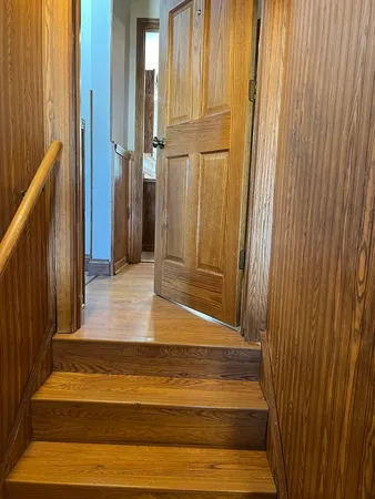 a kitchen with sink a window and stainless steel appliances