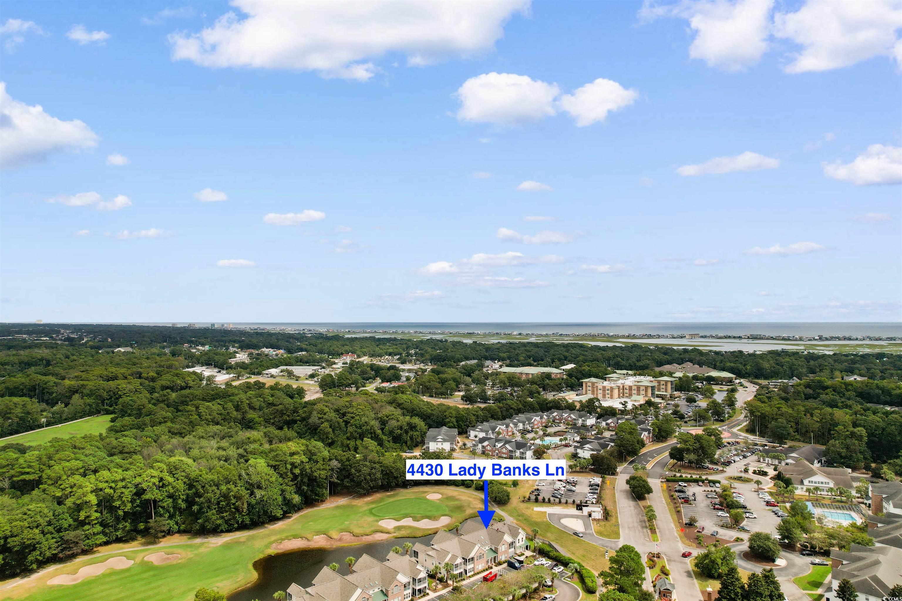 4430 Lady Banks Lane, Unit A2 Murrells Inlet, SC 29576 - Photo 30 of 31 Drone / aerial view of a nearby body of water