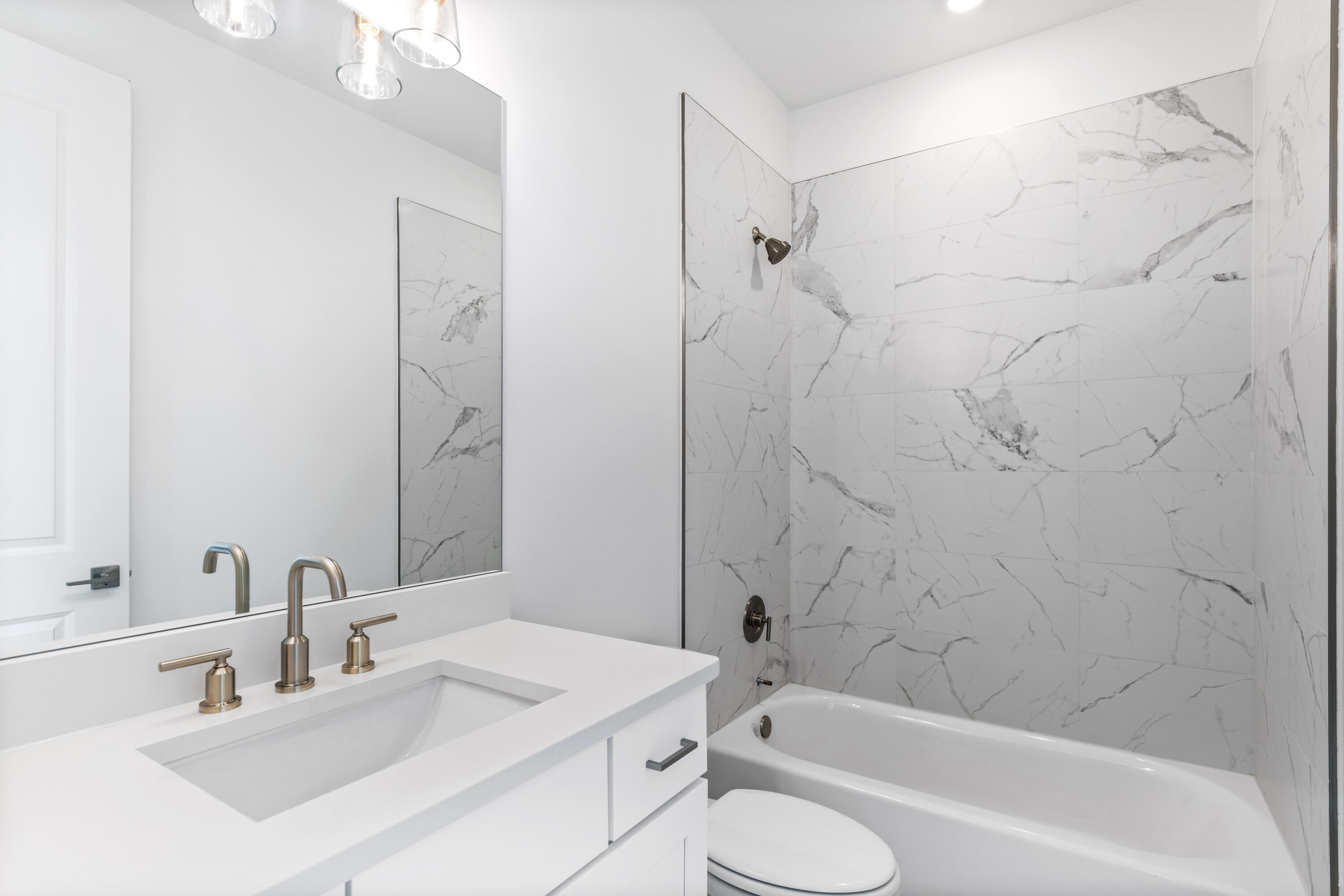 141 Brizo Lane, Unit LOT 4 Santa Rosa Beach, FL 32459 - Photo 15 of 32 a bathroom with a sink toilet and shower