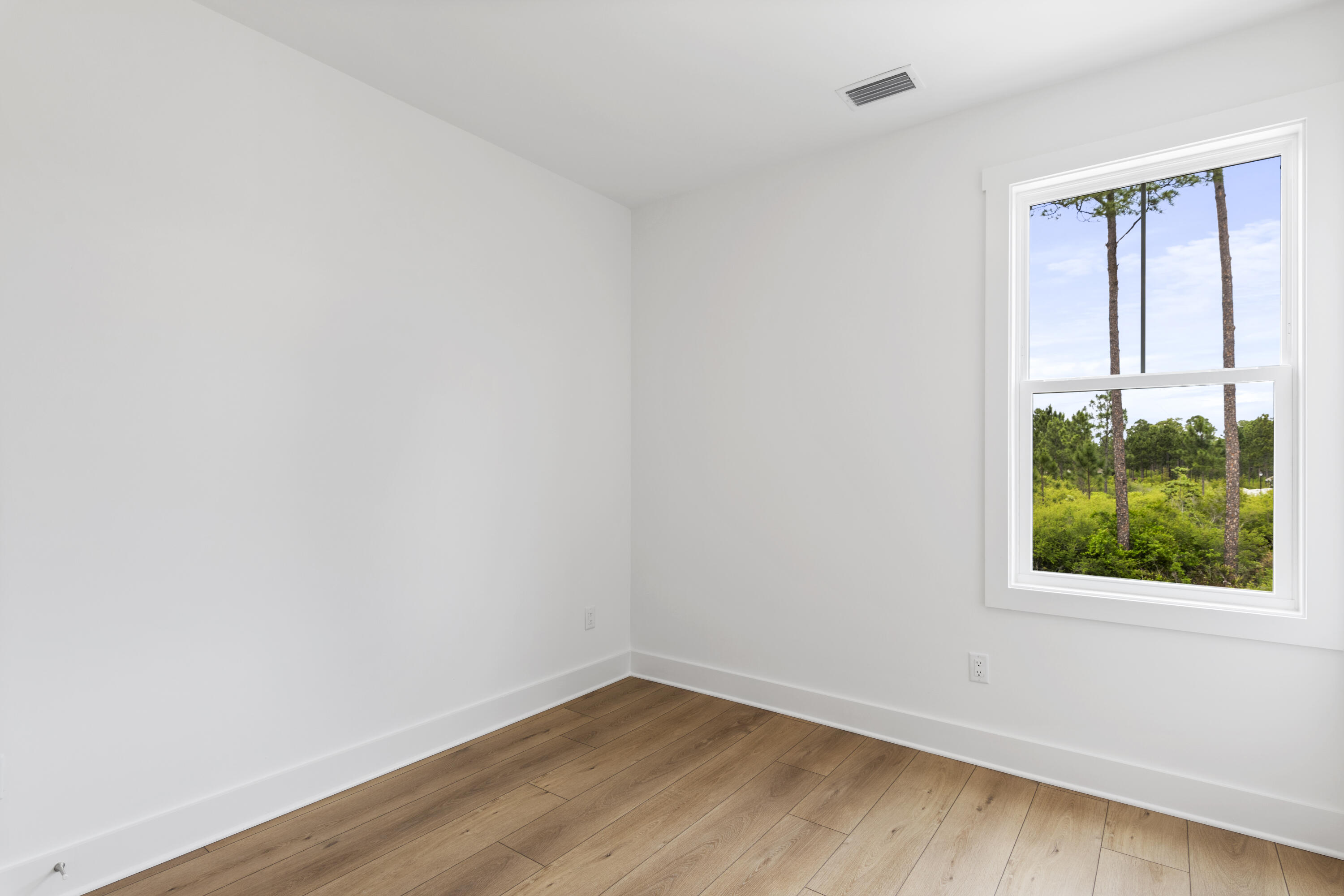 141 Brizo Lane, Unit LOT 4 Santa Rosa Beach, FL 32459 - Photo 19 of 32 an empty room with a window