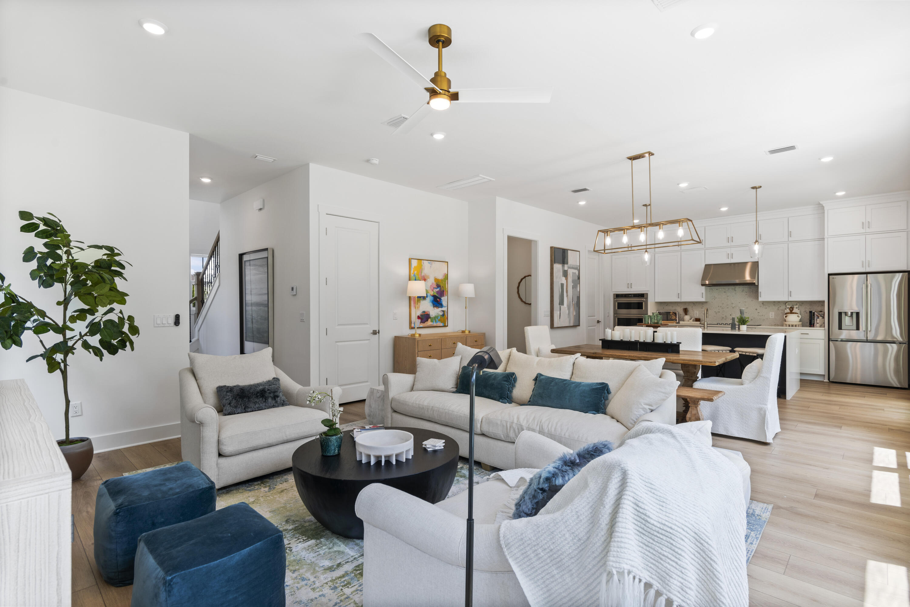 141 Brizo Lane, Unit LOT 4 Santa Rosa Beach, FL 32459 - Photo 3 of 32 a living room with furniture kitchen view and a chandelier