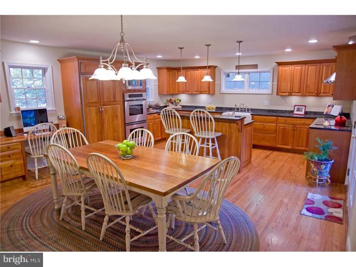 1 Rose Hill Road Media, PA 19063 - Photo 11 of 24 a view of a dining area with furniture and chandelier