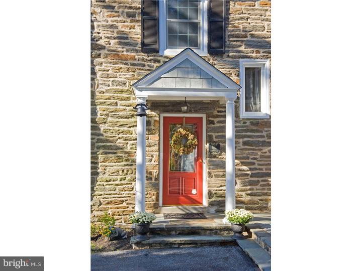 1 Rose Hill Road Media, PA 19063 - Photo 3 of 24 a front view of a house with an entrance