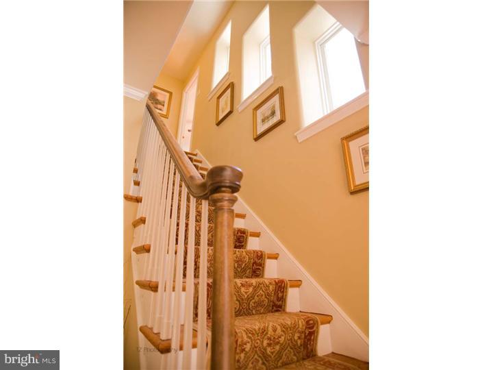 1 Rose Hill Road Media, PA 19063 - Photo 5 of 24 a view of a hallway with windows