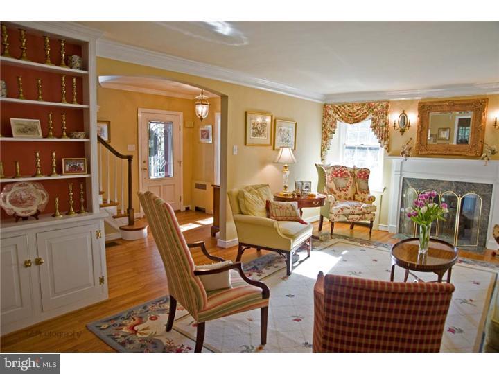 1 Rose Hill Road Media, PA 19063 - Photo 6 of 24 a living room with furniture a fireplace and a large window