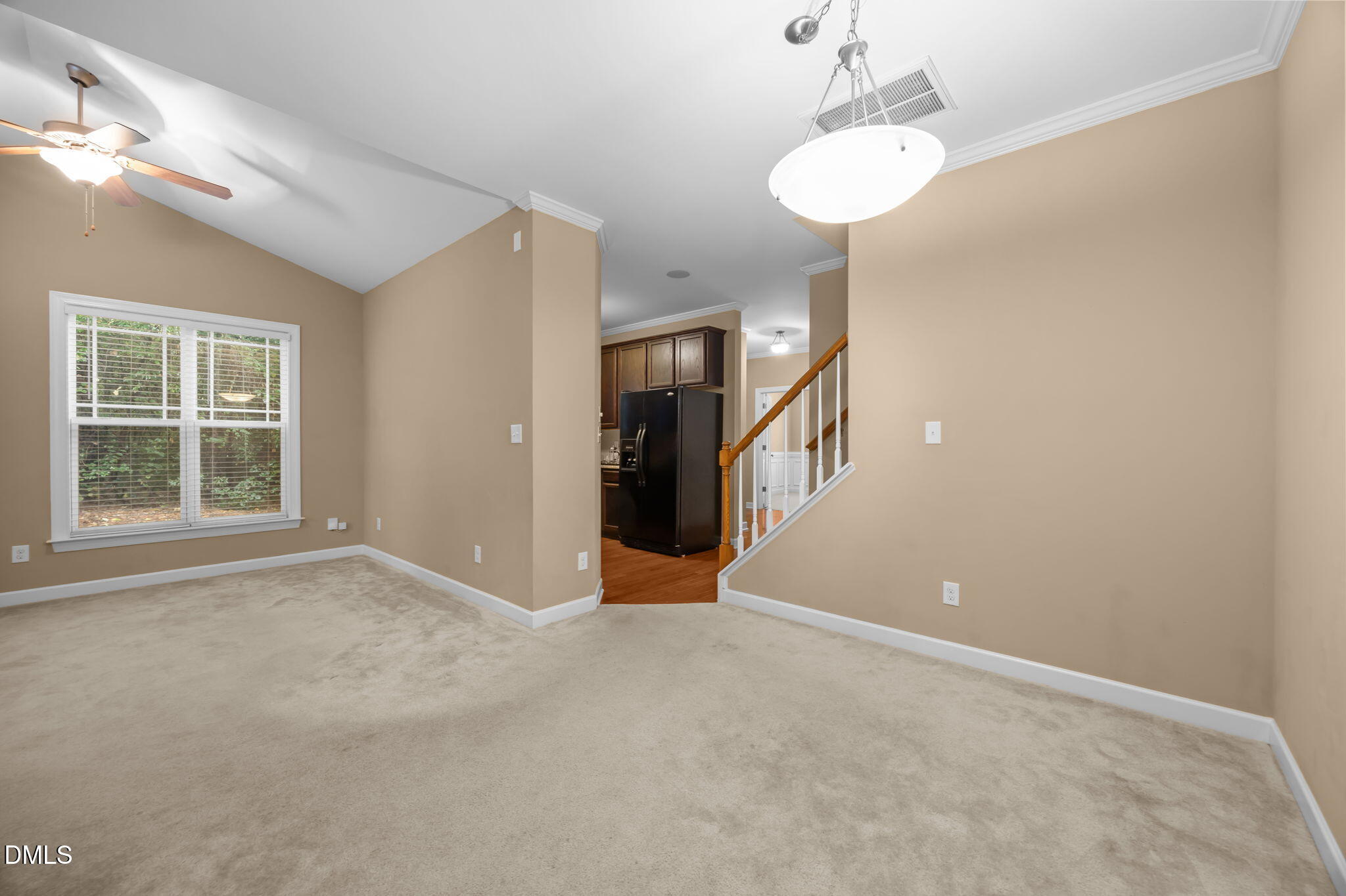 1929 Fieldhouse Avenue Raleigh, NC 27603 - Photo 10 of 29 a view of a livingroom with a chandelier fan