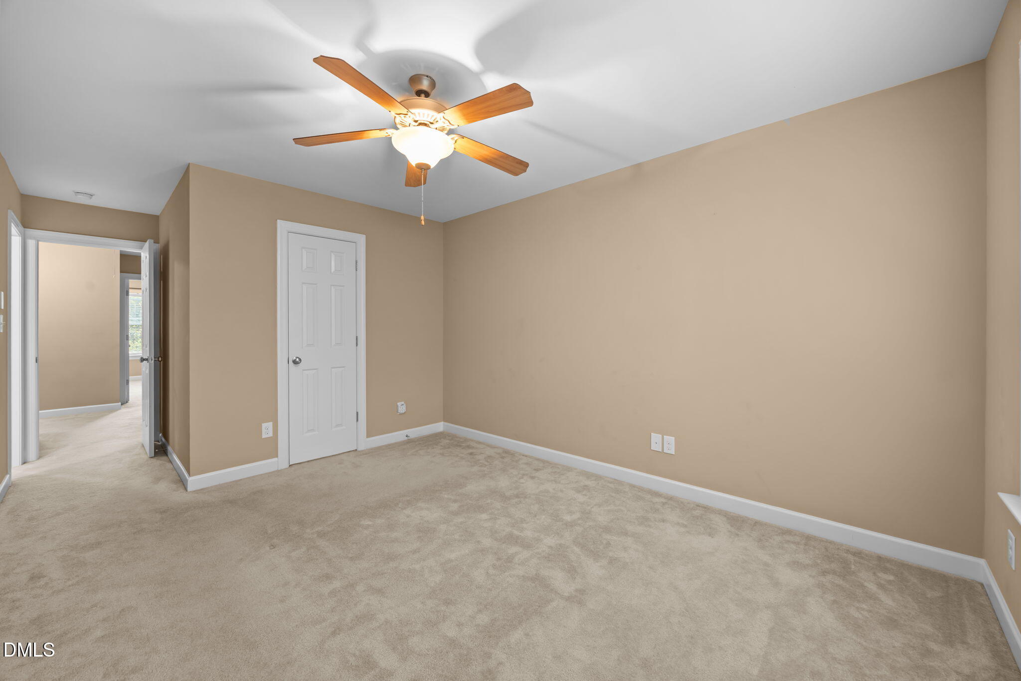 1929 Fieldhouse Avenue Raleigh, NC 27603 - Photo 16 of 29 an empty room with a ceiling fan and a window