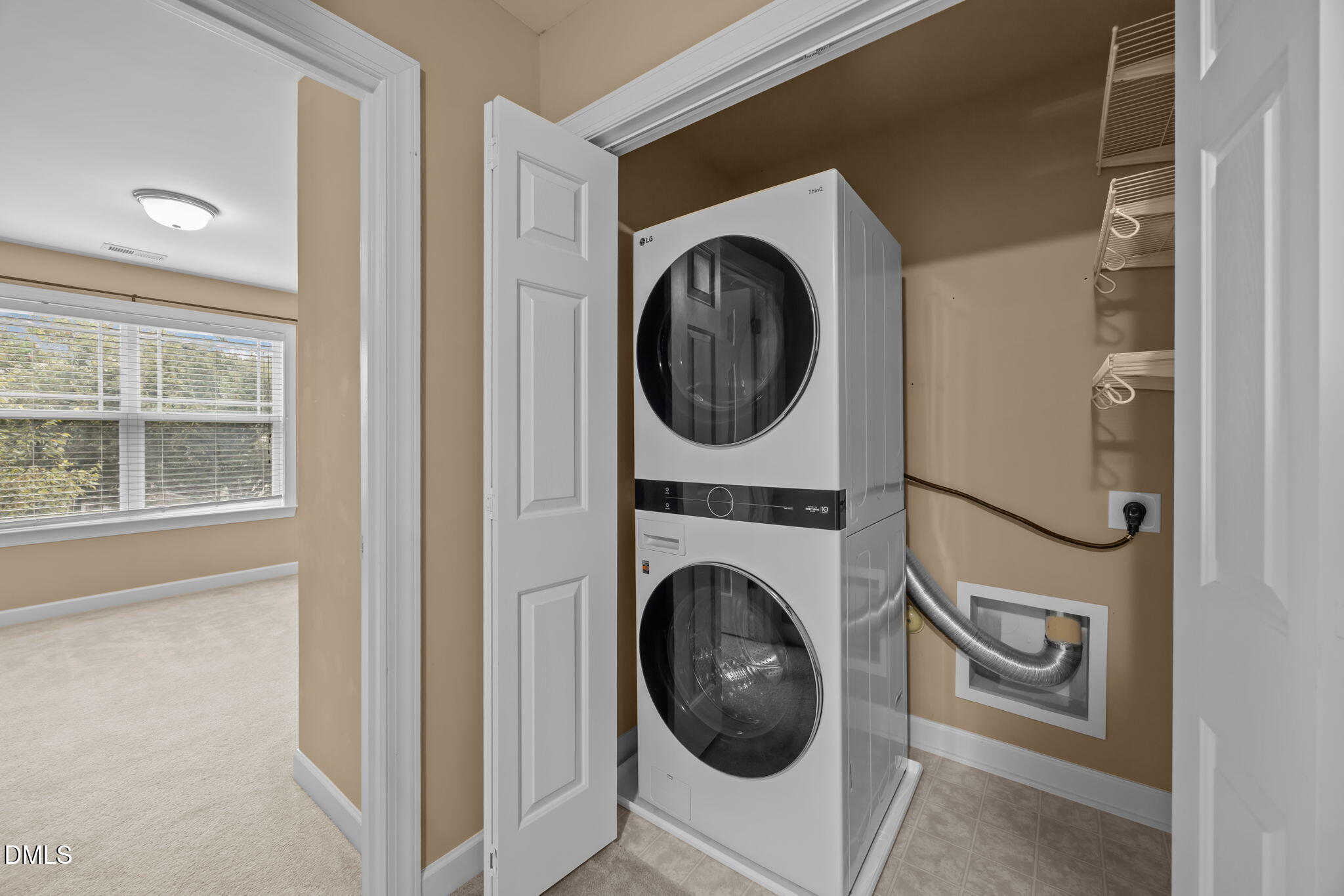 1929 Fieldhouse Avenue Raleigh, NC 27603 - Photo 19 of 29 a view of a hallway with washer and dryer